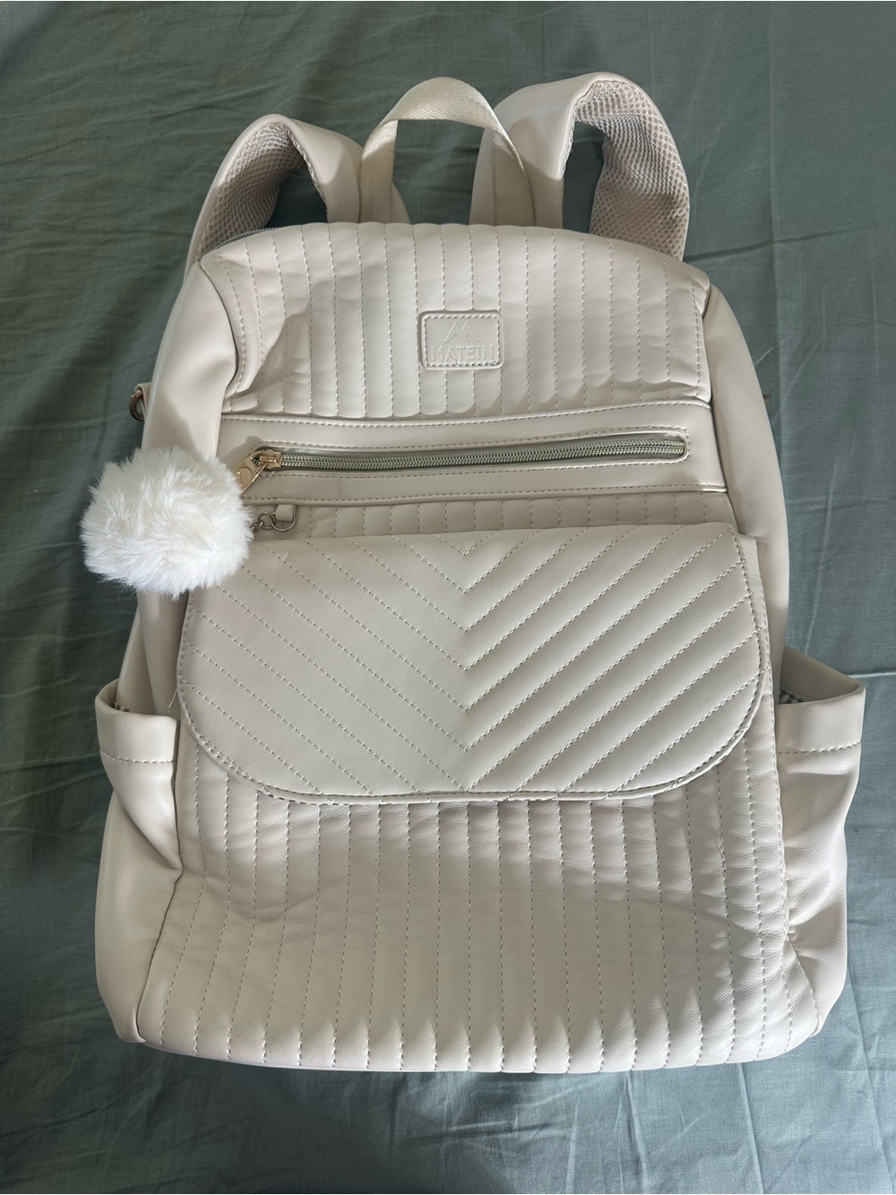 Cream Quilted Women's Backpack with Pom Pom Charm